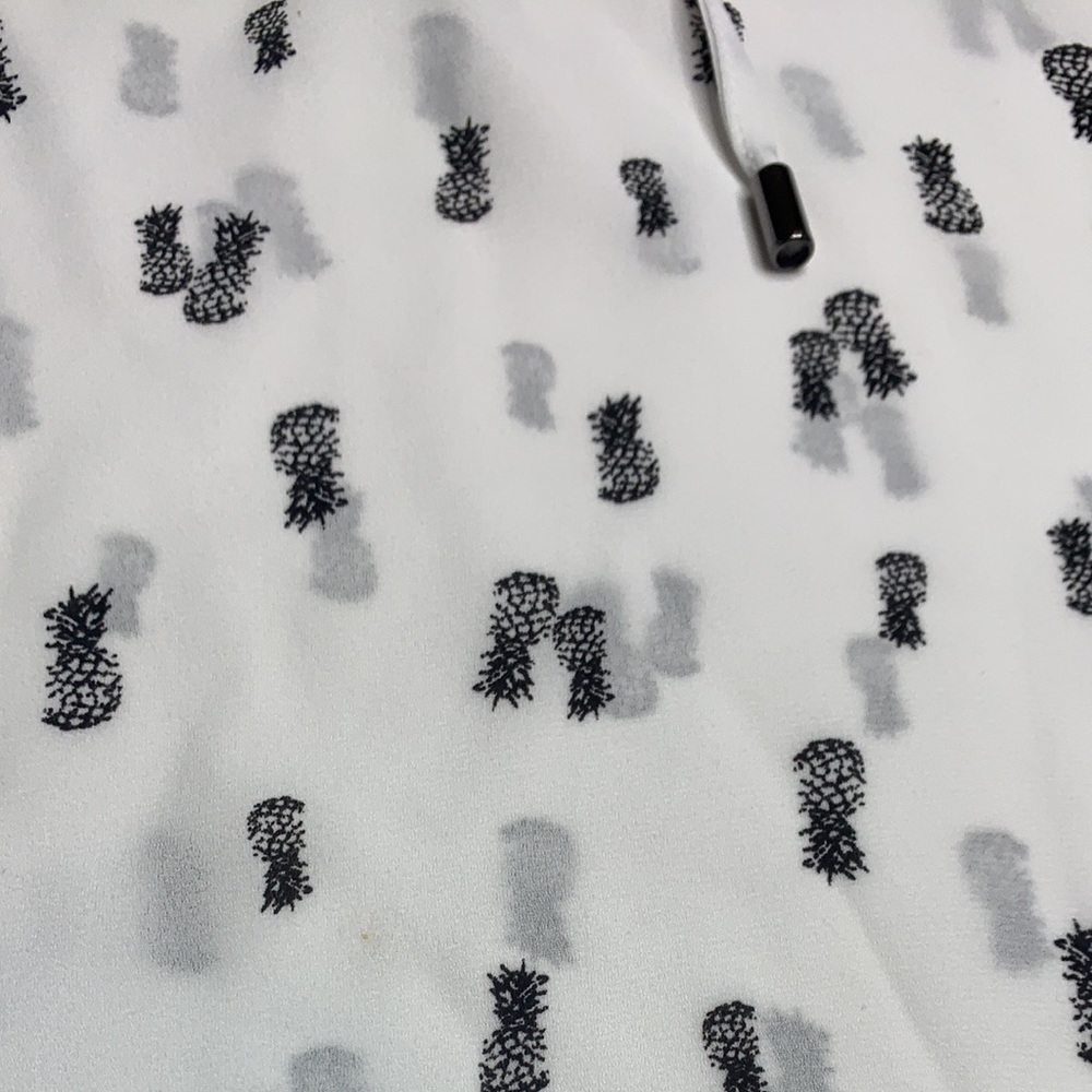 White and Black Pineapple blouse cute tie on top.